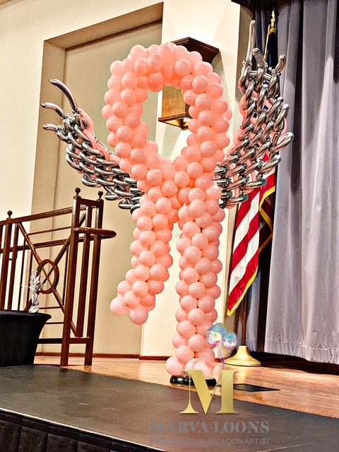Pink breast cancer awareness ribbon angel balloon sculpture by Marva-loons Balloons in Memphis